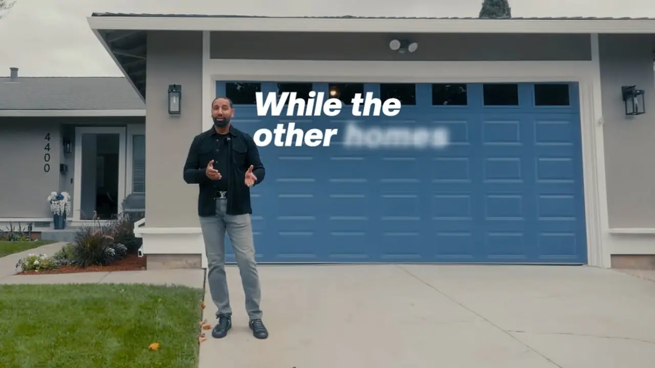 Film still: agent in front of a garage, 4400 Hampshire Pl, San Jose