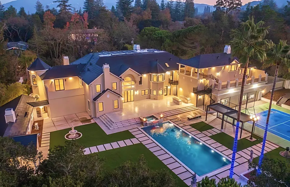 Estate pool: full backyard from above at dusk